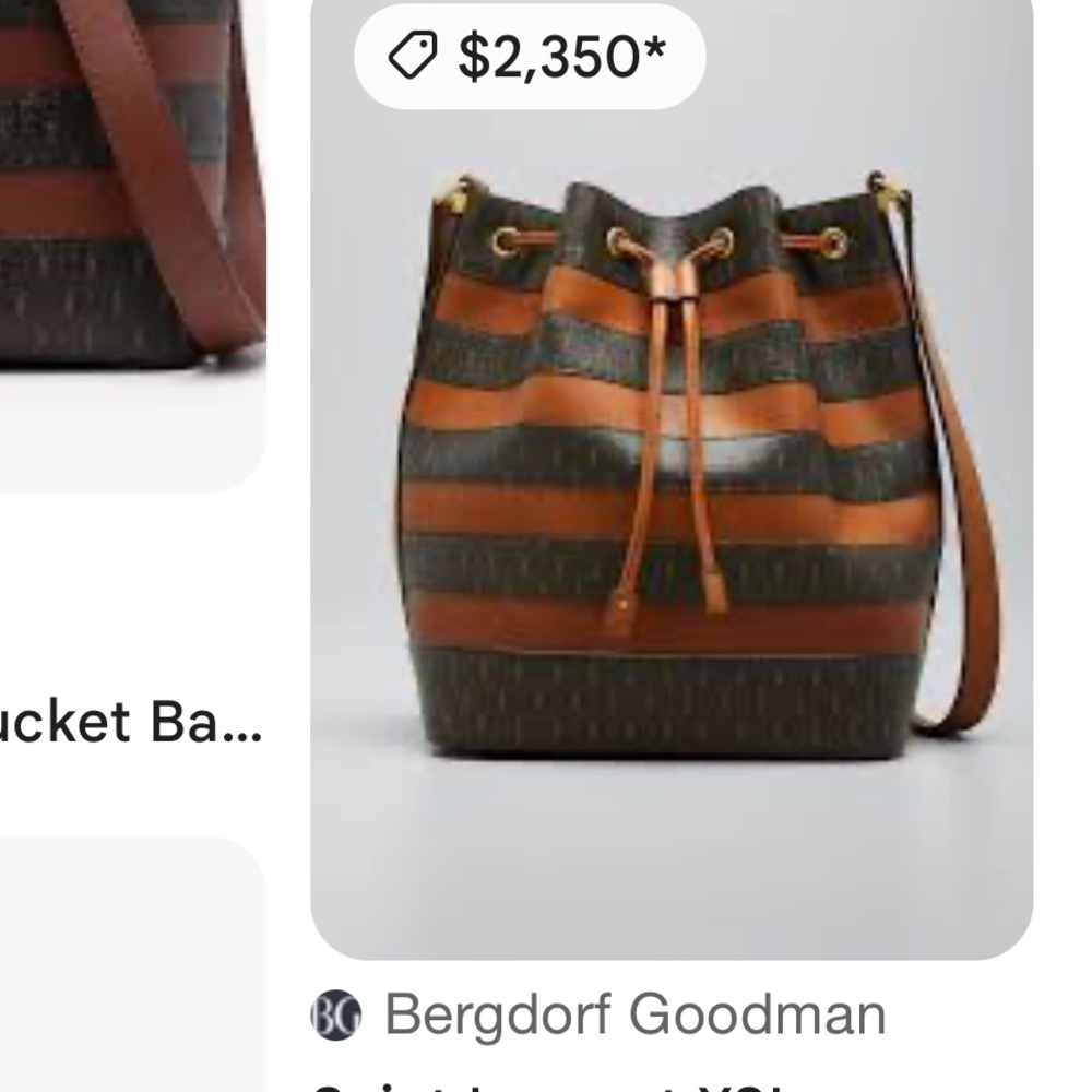 SAINT LAURENT
YSL Monogram Striped Drawstring Bucket Bag